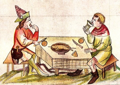 Cloth hangs half way between table and floor, 2 men seated